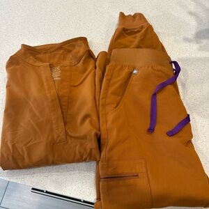 TWO sets of figs scrubs set (XS)